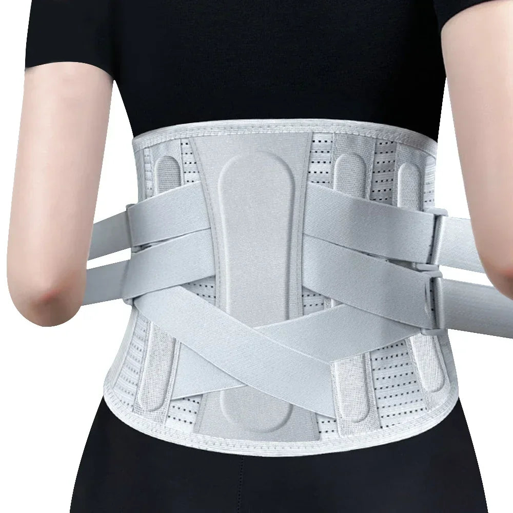 Adjustable posture corrector belt on person’s lower back, breathable gray support design