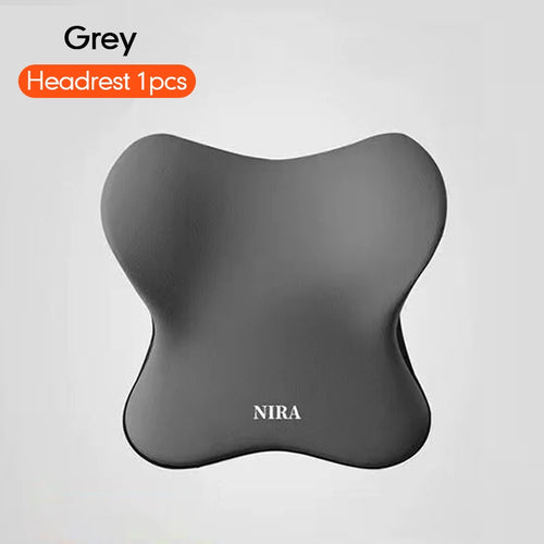 Grey ergonomic headrest cushion with butterfly shape and NIRA text on front, isolated on white
