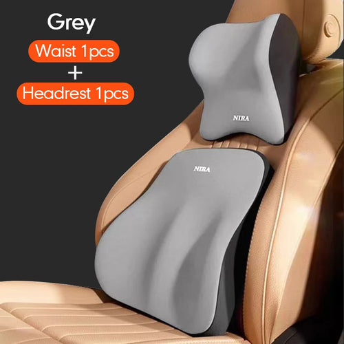 Grey memory foam car seat lumbar support and headrest cushions on tan car seat