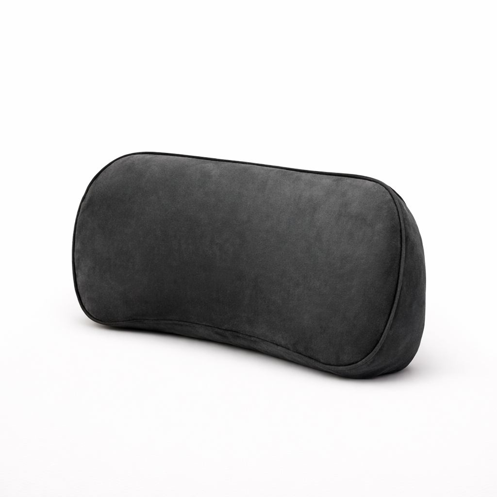 Ergonomic black lumbar support cushion for posture correction, isolated on white background.